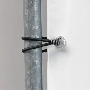 Gooseneck bungee loop securing an outdoor advertising banner to a metal frame.