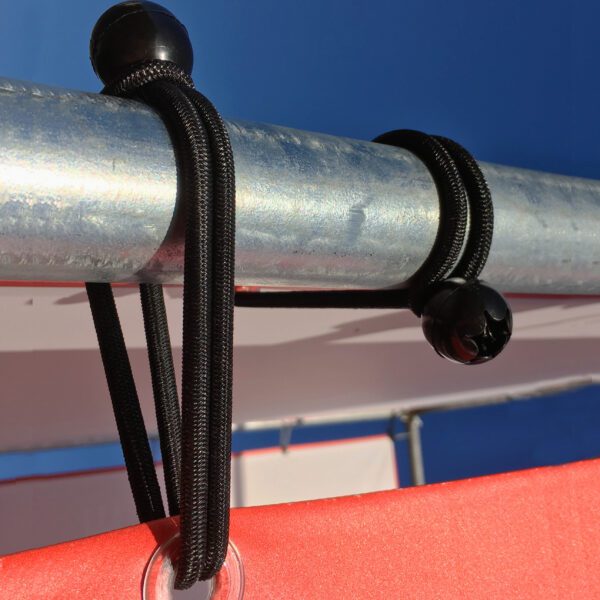 Bungee loop with plastic ball ties holding an advertising banner on steel frame